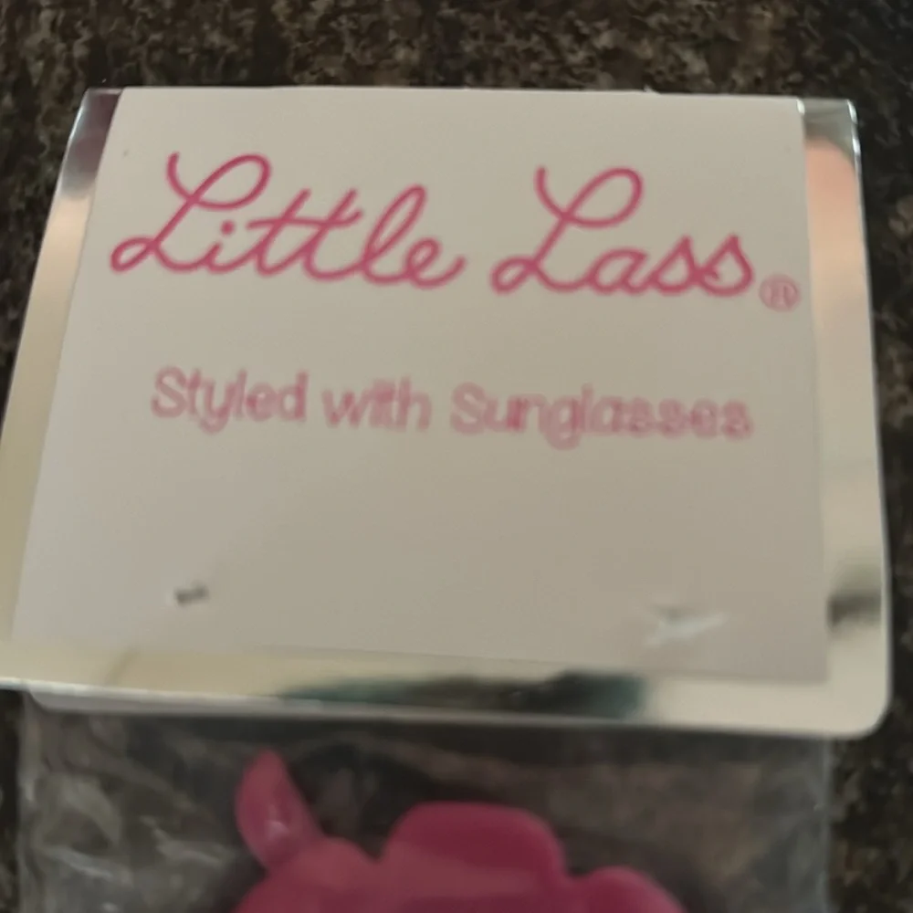 Girls pink flower petal sunglasses by Little Lass